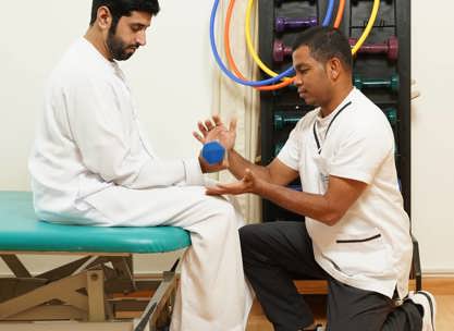 Preparing for inpatient rehabilitation with a therapist during a hand-therapy session